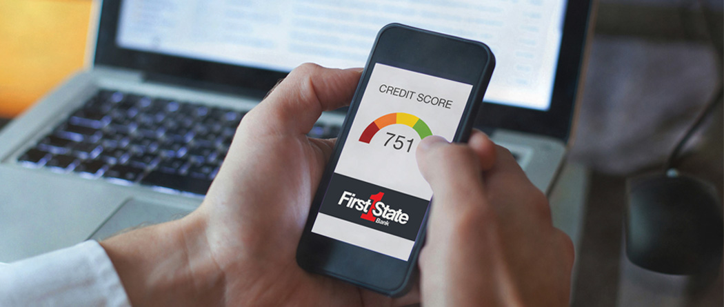 someone viewing their credit score from their phone