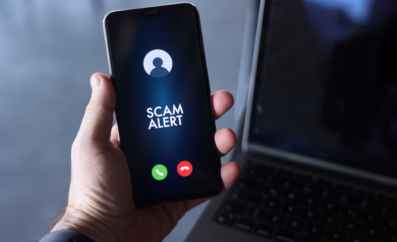 scam alert on mobile phone