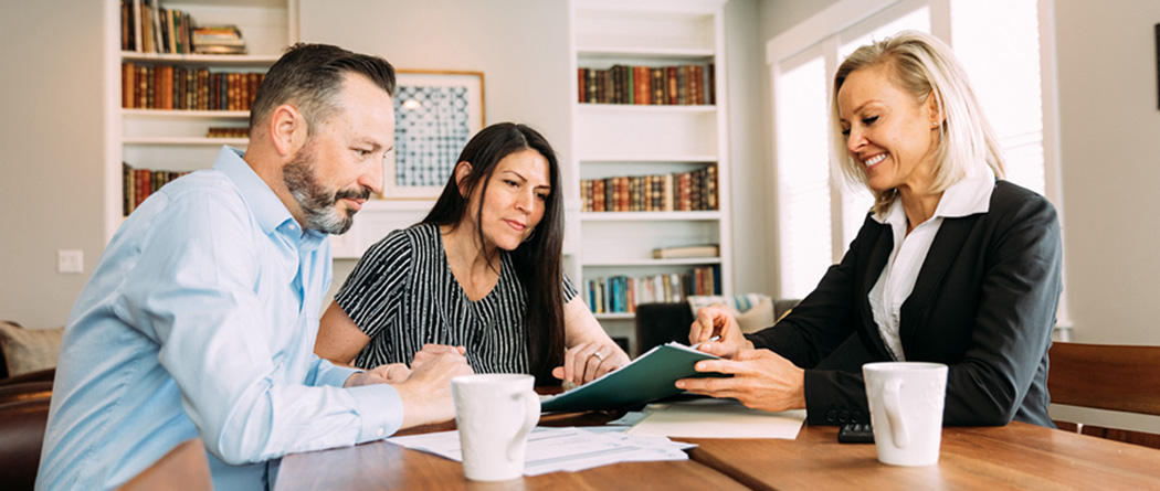 couple consults with tax advisor